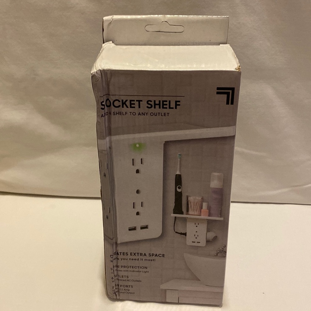 Socket shelf accessory holder and recharging station